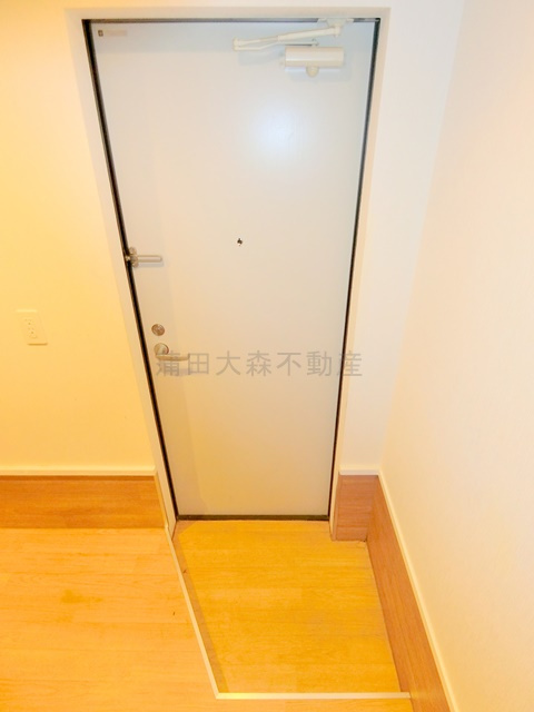 フェリシテ大田区中央の玄関