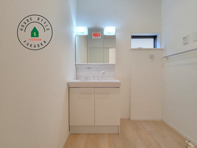 福岡市西区野方5丁目第15-2棟（1号棟）の内観：施工例|洗面所は小さなプライベートスペース。歯磨き、洗顔と毎日施す個人空間。