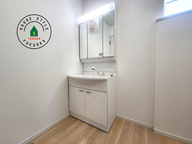 福岡市西区野方5丁目第15-2棟（1号棟）の内観：施工例|洗面所は小さなプライベートスペース。歯磨き、洗顔と毎日施す個人空間。