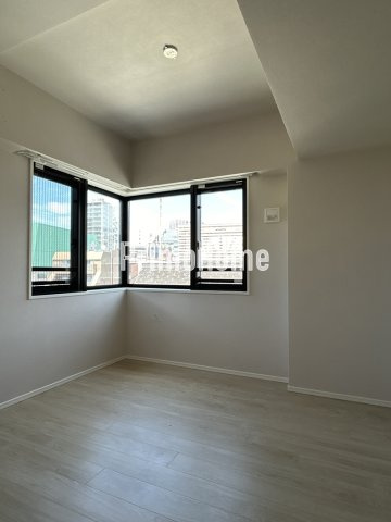 リブクオーレ神保町の洋室