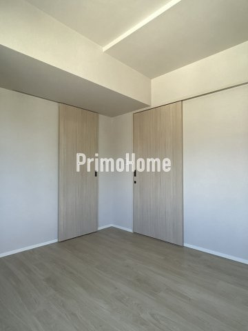 リブクオーレ神保町の洋室