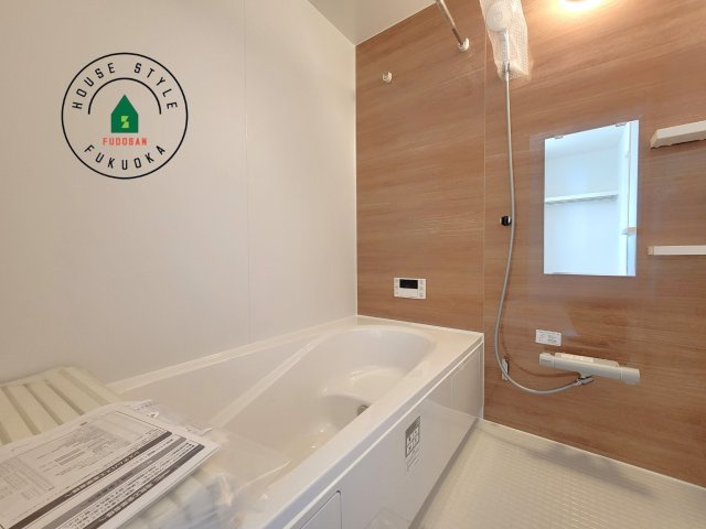 古賀市天神7丁目第5-2棟（2号棟）の内観：施工例|1日の疲れを癒してくれる広々バスルーム。雨の日のお洗濯にも大活躍な浴室乾燥機付です！