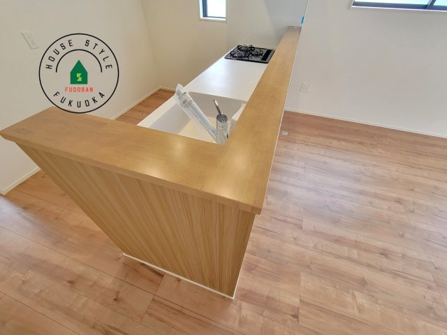 古賀市天神7丁目第5-2棟（1号棟）の内観：施工例|キッチンから立ち込める香りが今日の料理を期待させます。