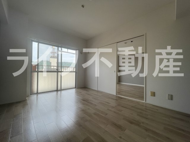 リアライズ住道南の寝室