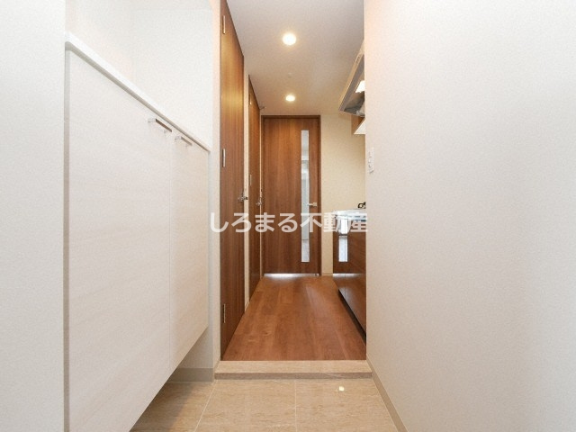 ファーストフィオーレ九条の玄関