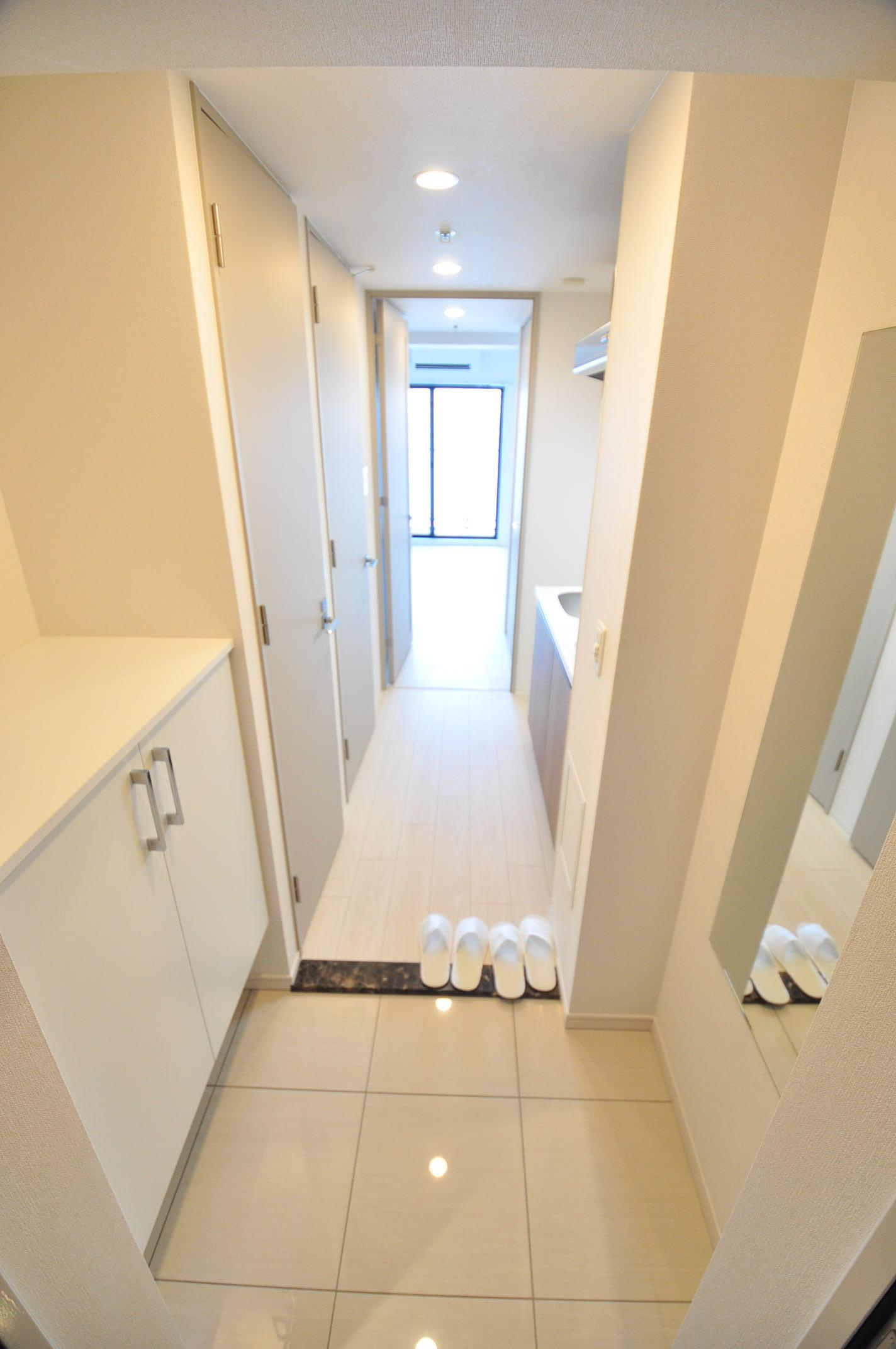 大阪市都島区中野町４丁目の賃貸マンションの玄関