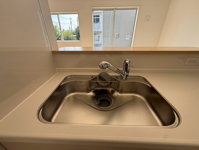 クレイドルガーデン中城村添石 第１・２号棟の浴室|浄水器付きキッチンの流し台