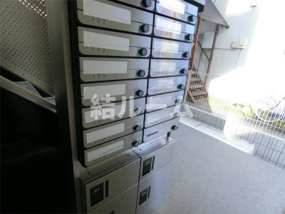 坂戸市関間１丁目の賃貸マンションのエントランス