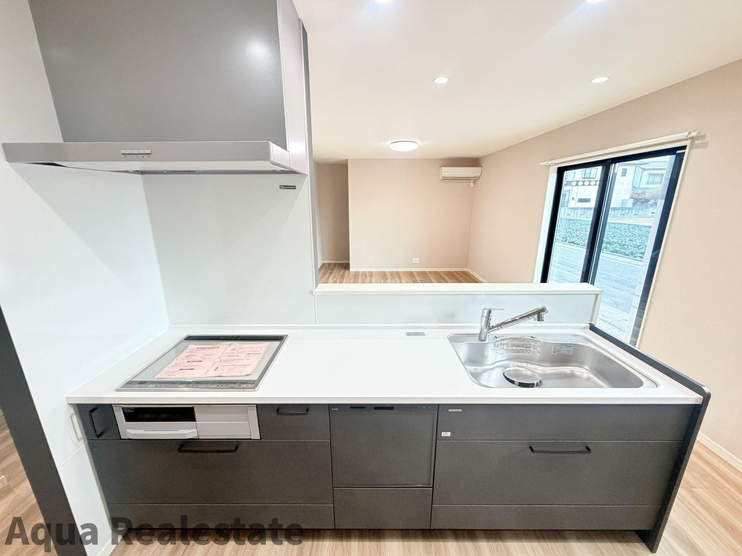 高松市牟礼町大町の新築一戸建のキッチン|使いやすい居間です