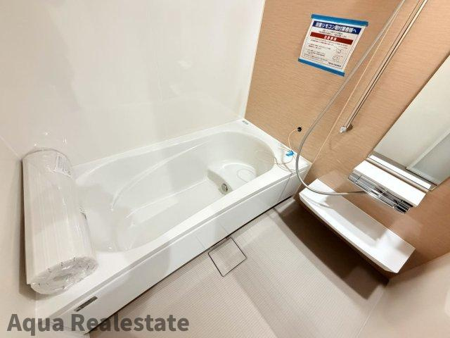 高松市成合町の新築一戸建のキッチン|使いやすい居間です