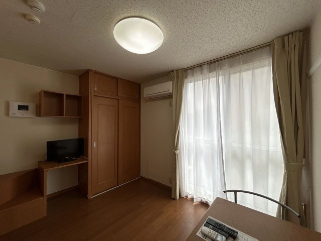 レオパレスプラムⅡの居間・リビング