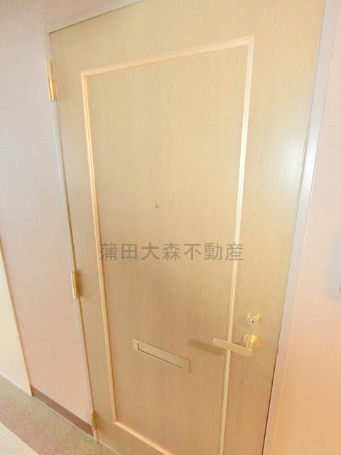 パインコート梅屋敷の玄関