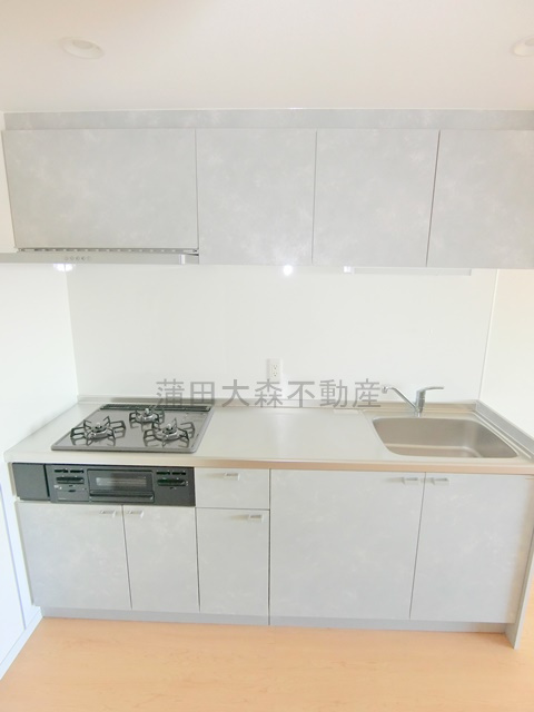 パインコート梅屋敷のキッチン|3口ガスグリル付システムキッチン　