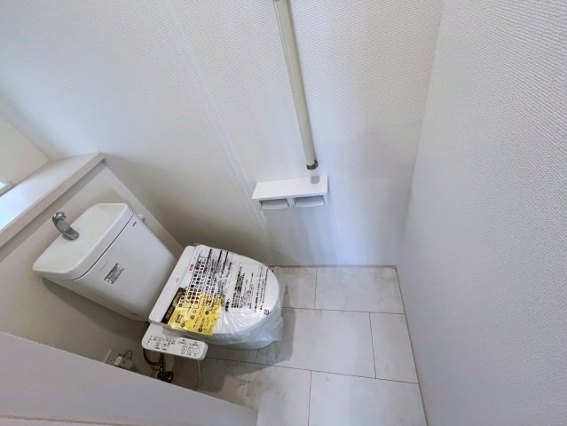 うるま市字川田の新築一戸建のトイレ