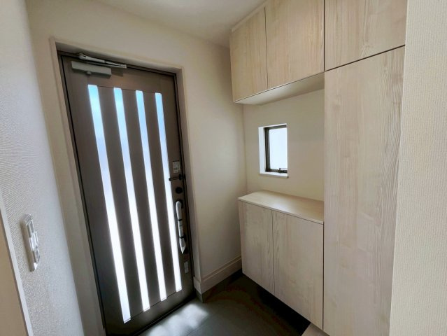 うるま市字川田の新築一戸建の玄関