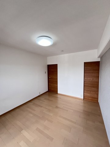 大阪市城東区成育５丁目の賃貸マンションの寝室