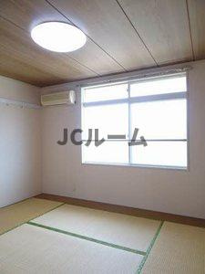 柏崎市田塚２丁目のアパートの寝室