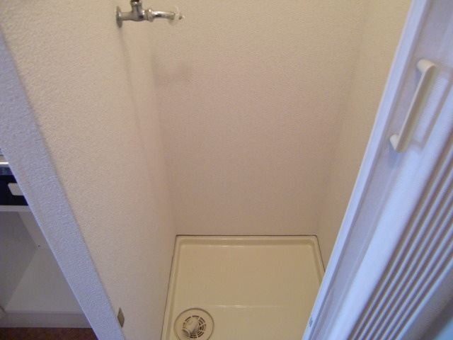 シャトラン弓木三番館の洗面所|室内洗濯パン