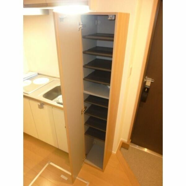 アルーエム千田の玄関