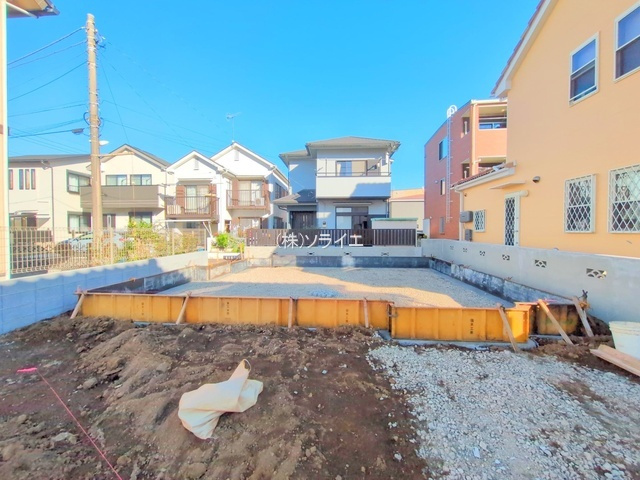 所沢市東狭山ヶ丘11期　ハートフルタウン　新築戸建の前面道路含む現地写真