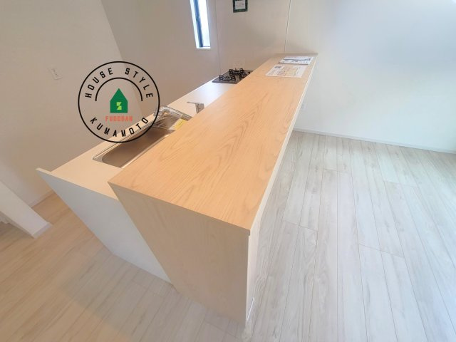 熊本市西区城山大塘2丁目第1-1棟（1号棟）　の内観：施工例|キッチンから立ち込める香りが今日の料理を期待させます。