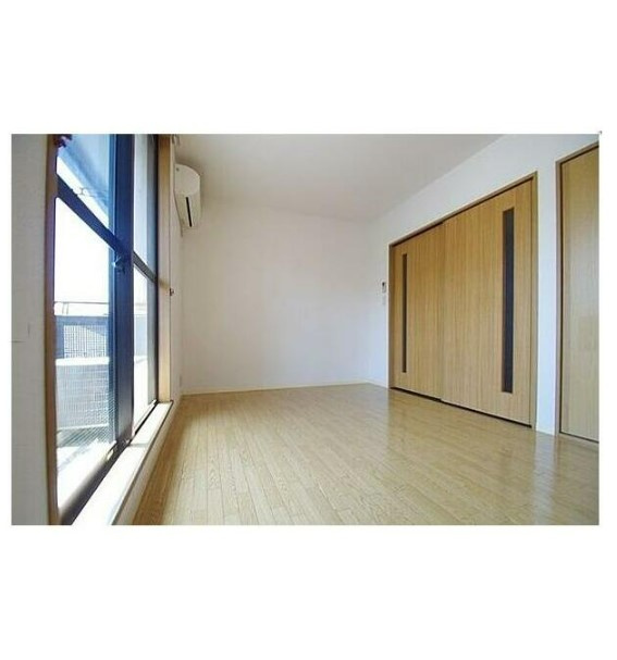 川崎市麻生区高石１丁目のアパートの寝室