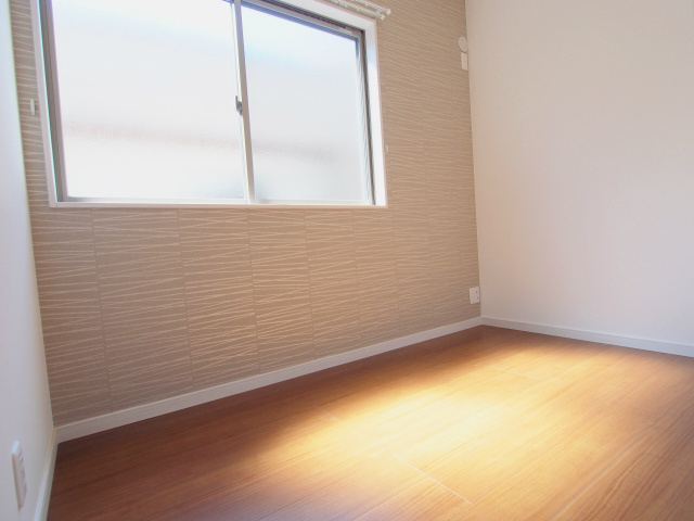 ロイヤルヴィラ向洋 A棟の寝室