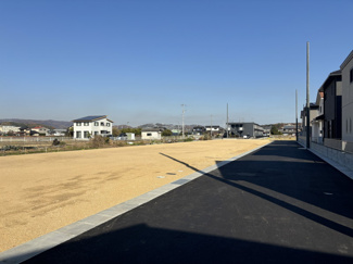 【外観】 | 土地　玉島上成　全7区画 | 分譲地全体像。南側から撮影。