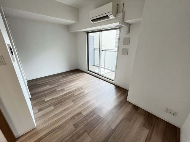 エスリード大阪城アクシスの居間・リビング|同物件別部屋の写真です。