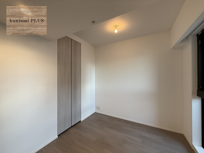 ジオタワー堺筋本町の洋室