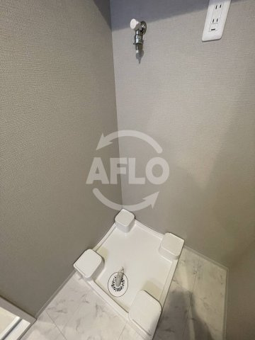 スプランディット福島WESTの洗面所|スプランディット福島WEST　室内洗濯機置き場