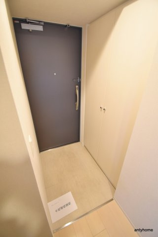 ミュプレ江坂　仲介手数料無料の玄関