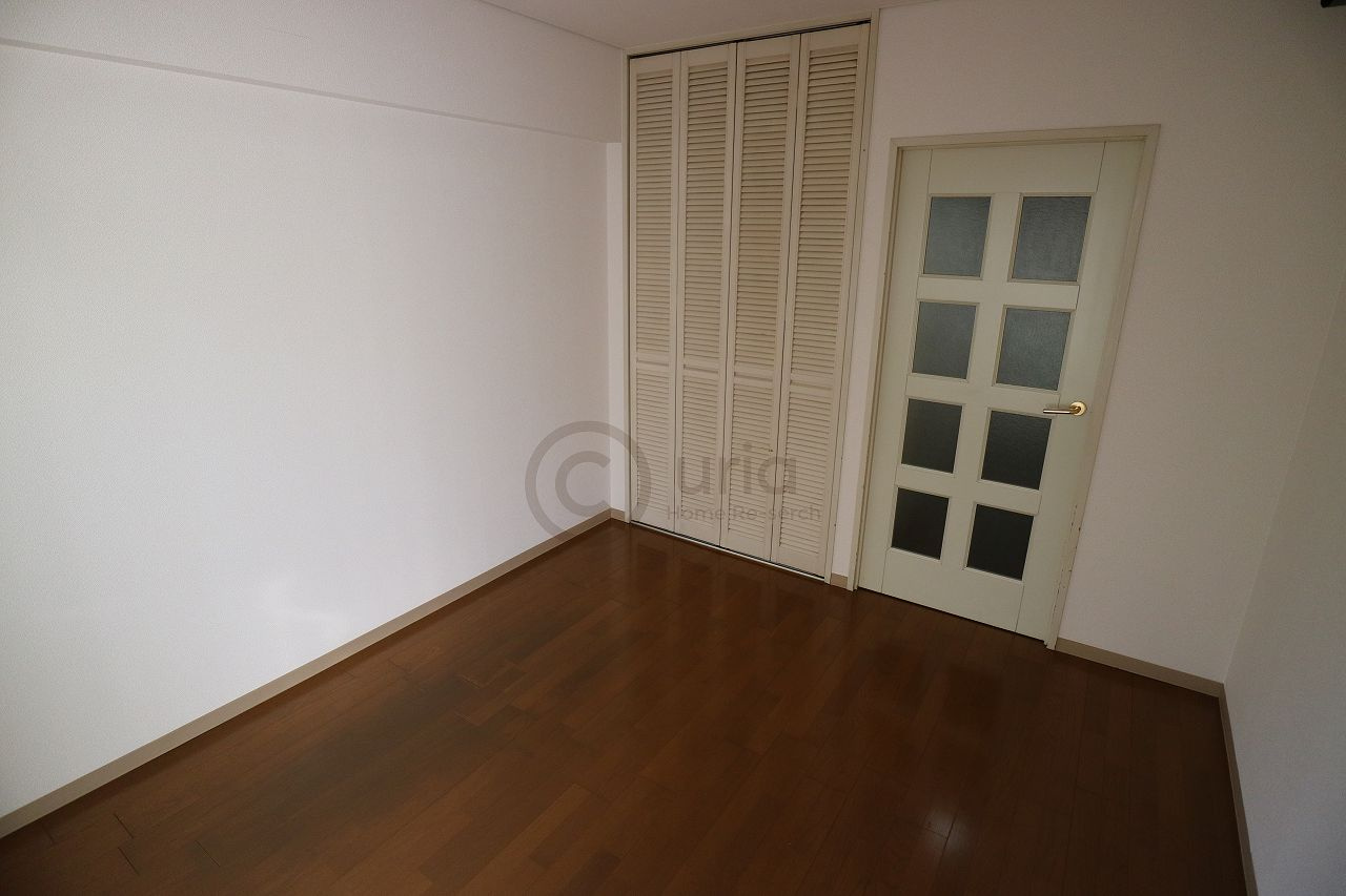 ジュネス深江の洋室