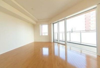 【居間・リビング】 | ユニゾンタワー | 12.5帖のきれいな洋室。