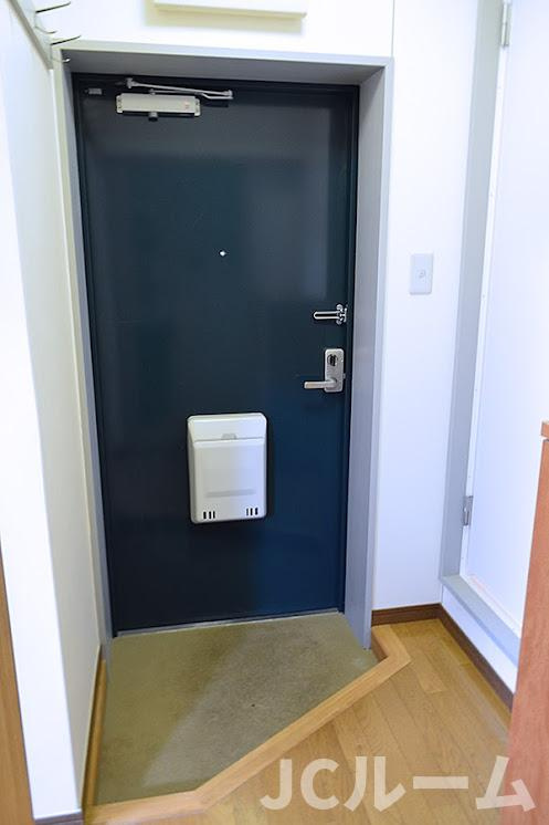 アシスト上越マンション３の玄関