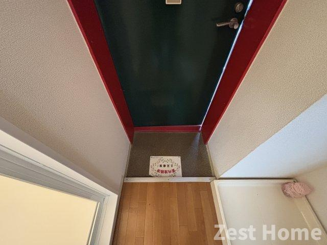 彩華Iの玄関