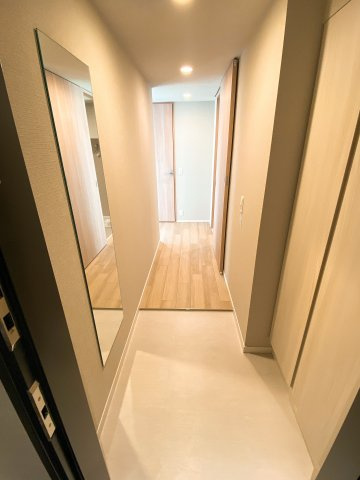 プラウドフラット上野松が谷の玄関