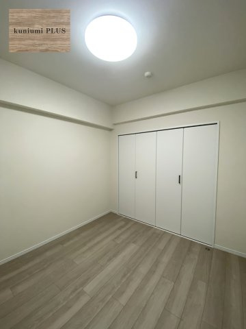 プレシオ野江の洋室