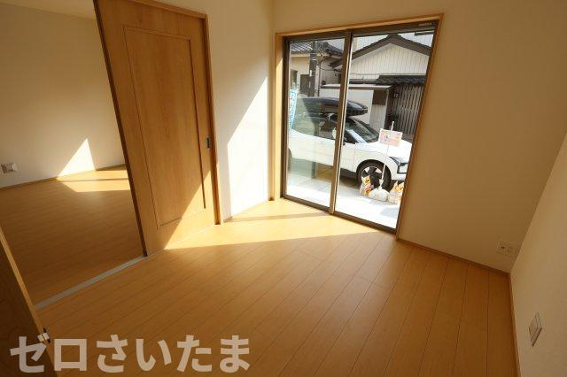 《仲介手数料無料》岩槻区本丸１丁目17-18新築一戸建てハートフルタウンの居間・リビング