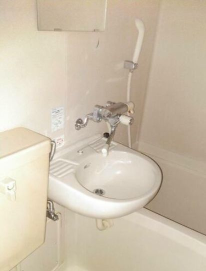 ファサードクロスの洗面所|洗面台