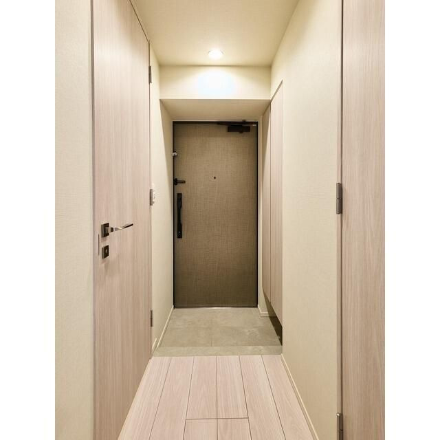 コンフォリア・リヴ西大島SOUTHの玄関