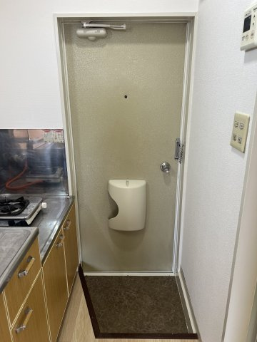 トピア仁井田の玄関