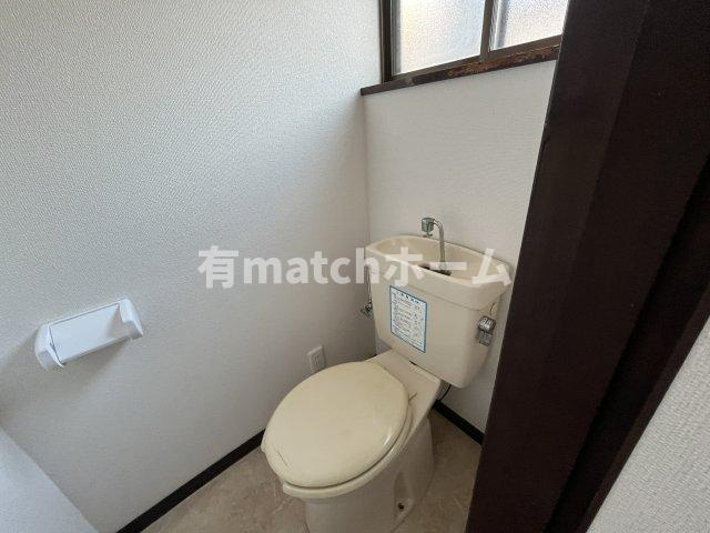 寝屋川市春日町店舗付き住宅のトイレ