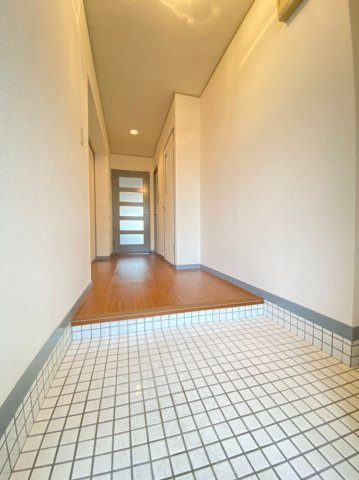 プレジオ王塚台の玄関