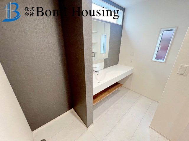 WIC等収納豊富・南向きバルコニー　竹の台1丁目　全2棟　2号棟の洗面所