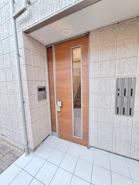 メゾンかしの木のエントランス