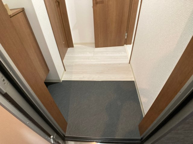 badge tomoi NordⅠの玄関