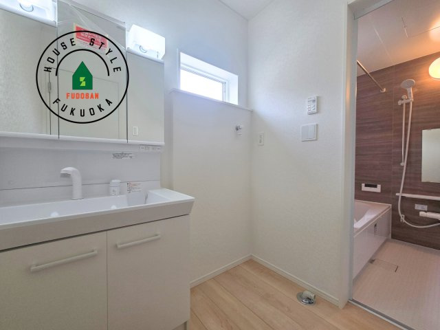 春日市一の谷1丁目第8-4棟（1号棟）の内観：施工例|脱衣所、洗面所は小さなプライベートスペース。歯磨き、洗顔と毎日施す個人空間。