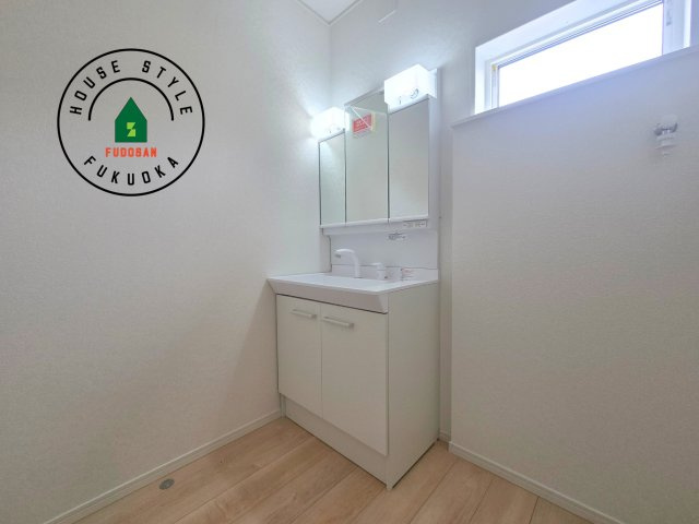 春日市一の谷1丁目第8-4棟（1号棟）の内観：施工例|洗面所は小さなプライベートスペース。歯磨き、洗顔と毎日施す個人空間。