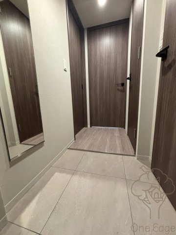 コンフォリア新大阪宮原Qの玄関